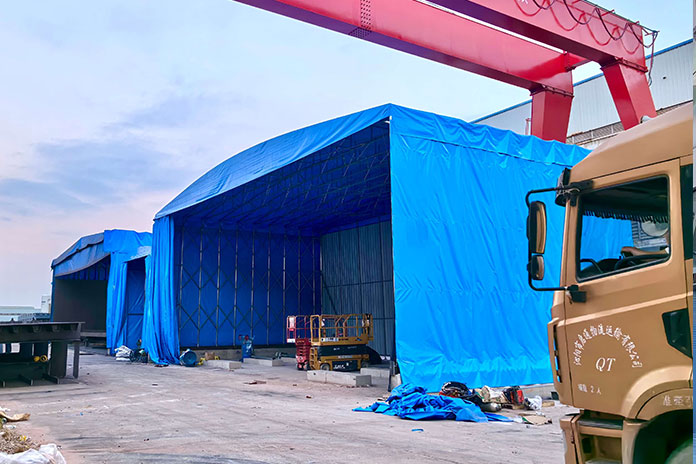 宏钢重工地面轨道伸缩雨棚